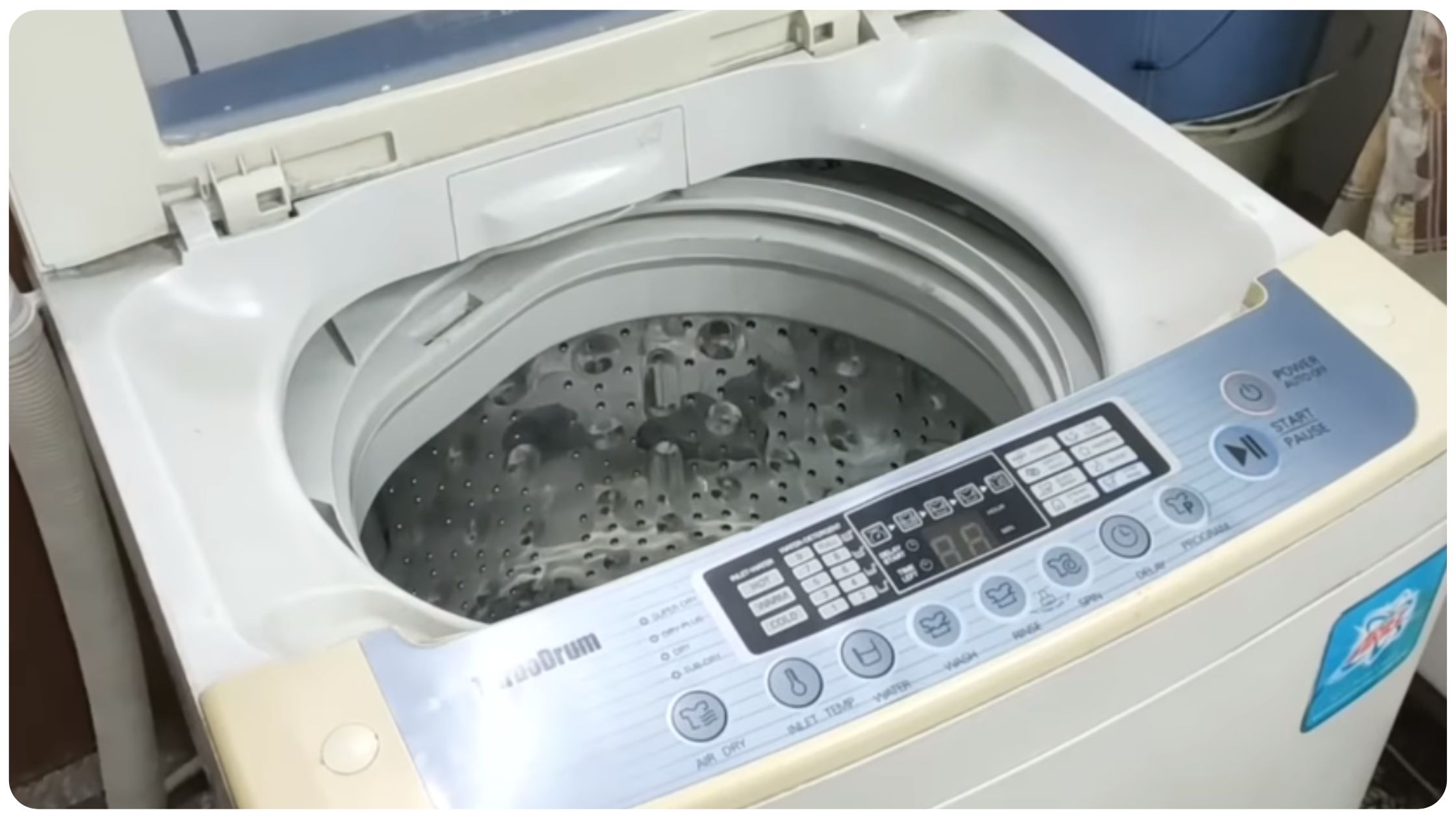 how to clean top load washing machine at home