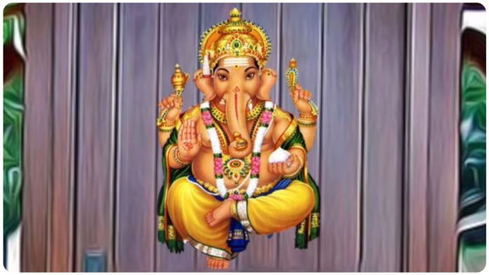 main door ganesh idol on entrance door